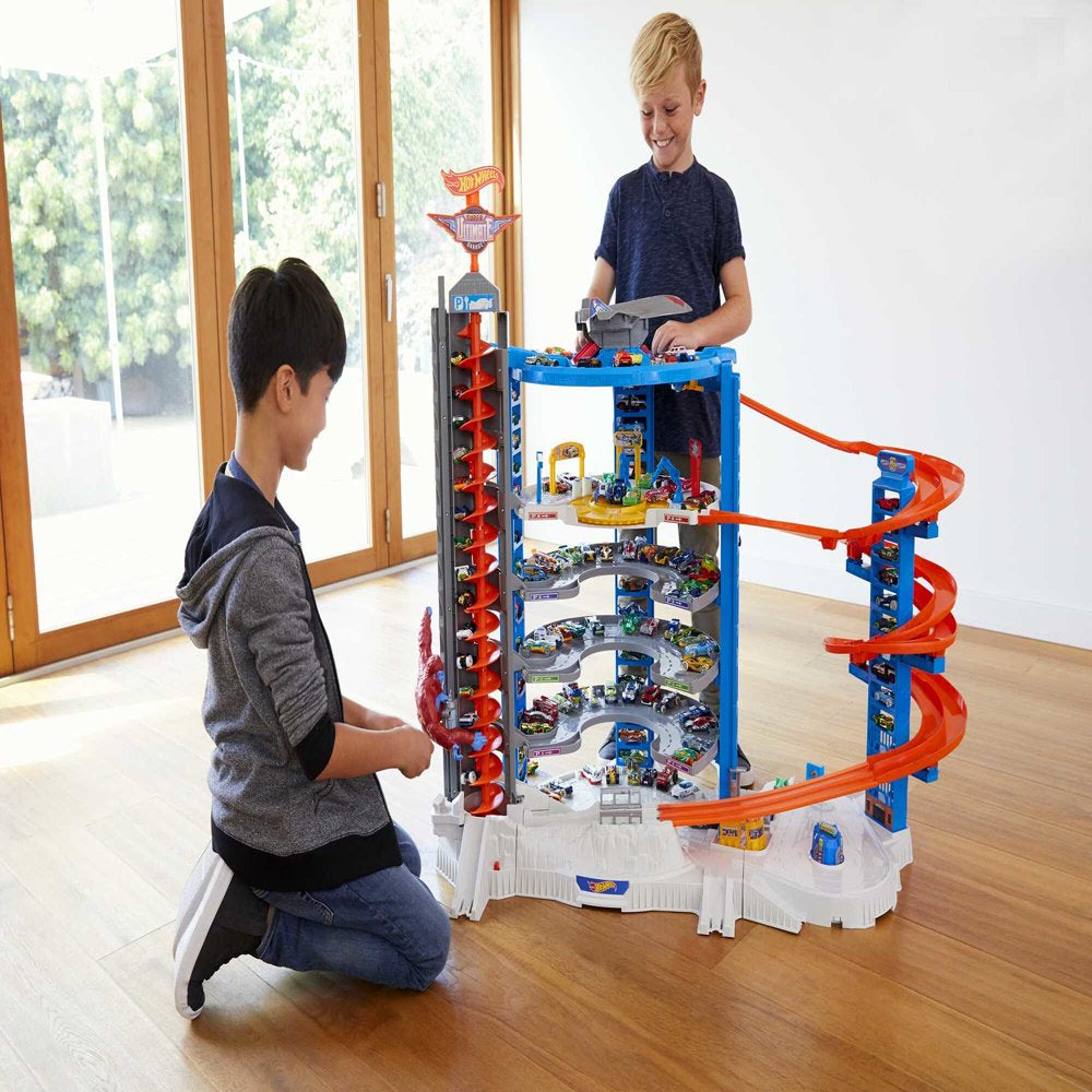 Hot Wheels Track Set with 4 1\u0026#58;64 Scale Toy Cars, Super Ultimate Garage, Over 3 Feet Tall - John Pierce Auto Care